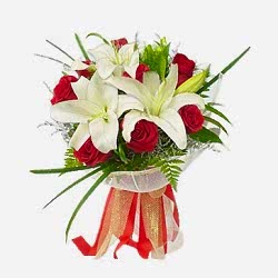 Send 2 lilies and Vibrant 9 Red Roses to Dhaka in Bangladesh