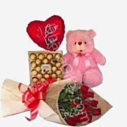 Send 12 Red Roses Bouquet,Pink Bear,Ferrero Rocher Chocolate with I Love U Balloon